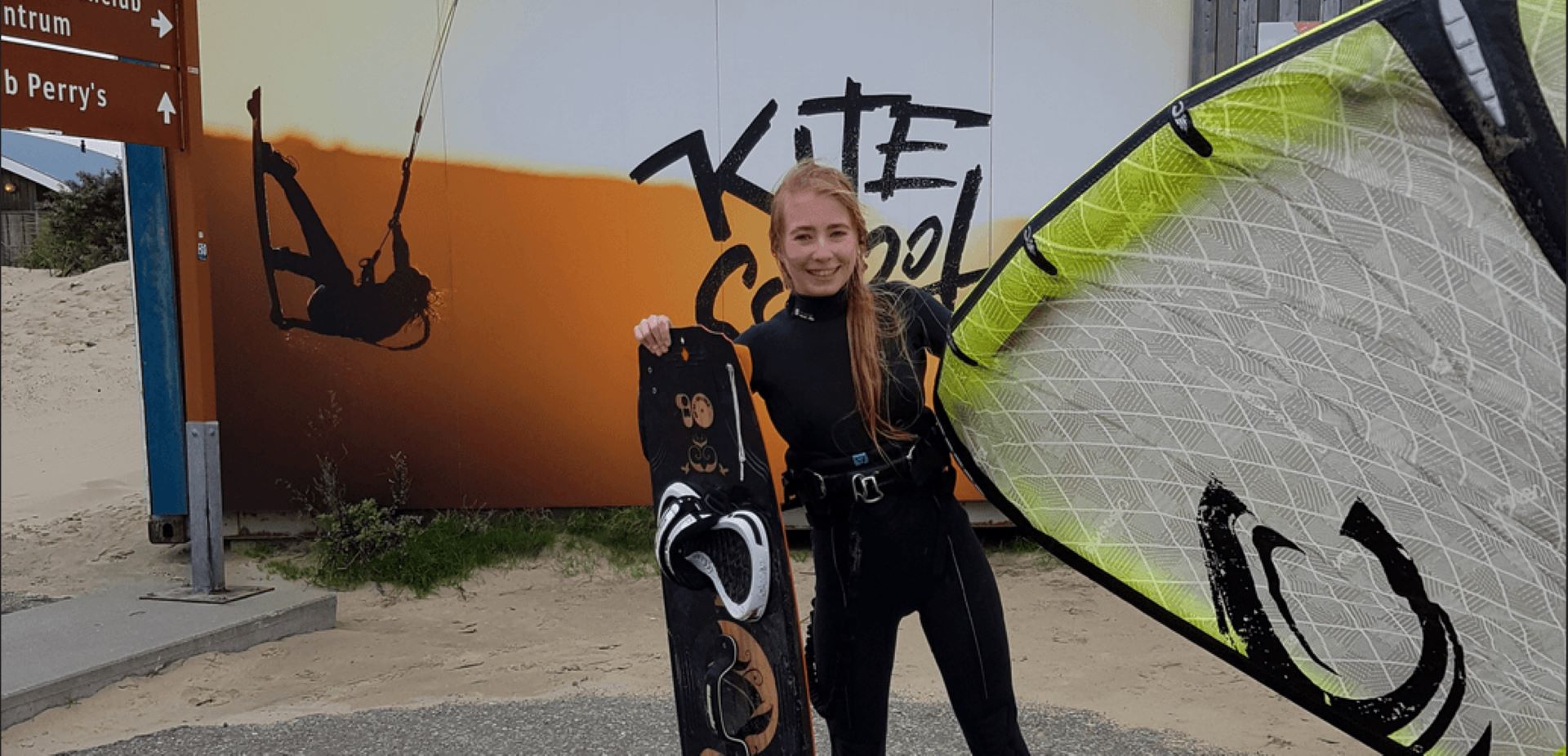 woman wearing kitesurf wetsuit